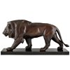 Art Deco style sculpture of a walking lion.