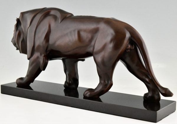 Art Deco style sculpture of a walking lion.