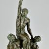 Art Deco sculpture of 3 athletes with palm leaf