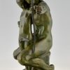 Art Deco bronze sculpture archer learning a boy to use a bow