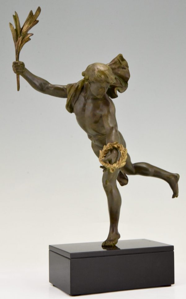 Antique sculpture of a man with laurel branch.