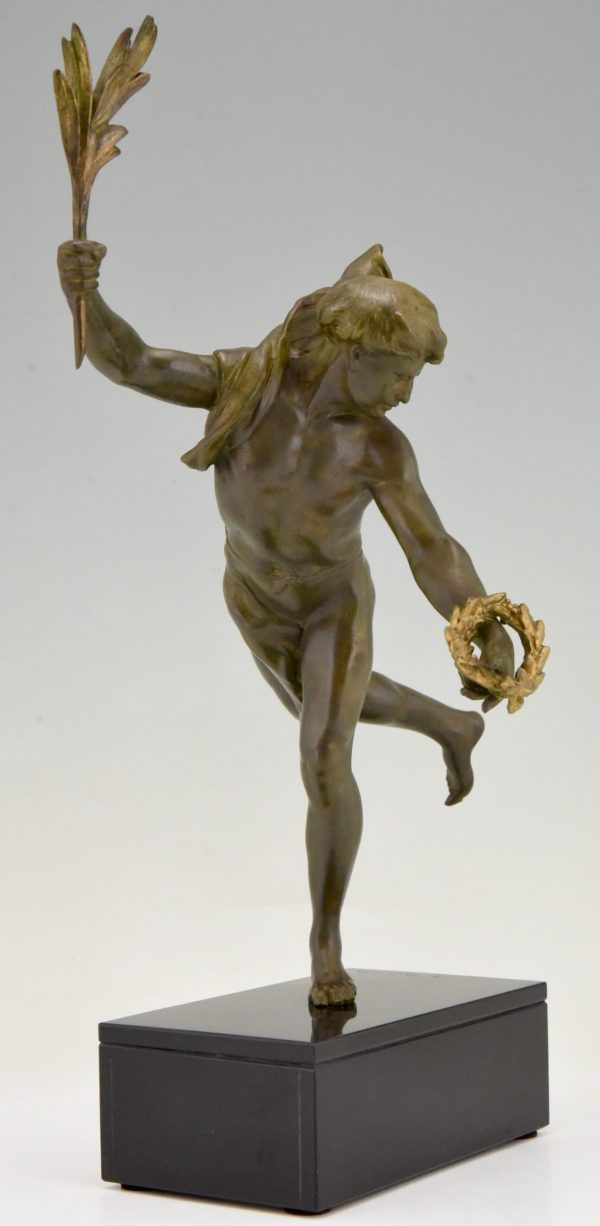 Antique sculpture of a man with laurel branch.