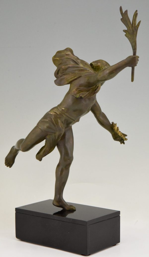 Antique sculpture of a man with laurel branch.