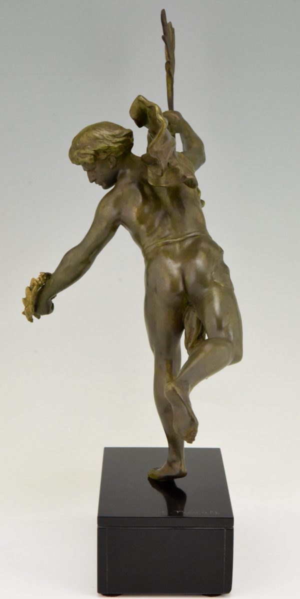 Antique sculpture of a man with laurel branch.