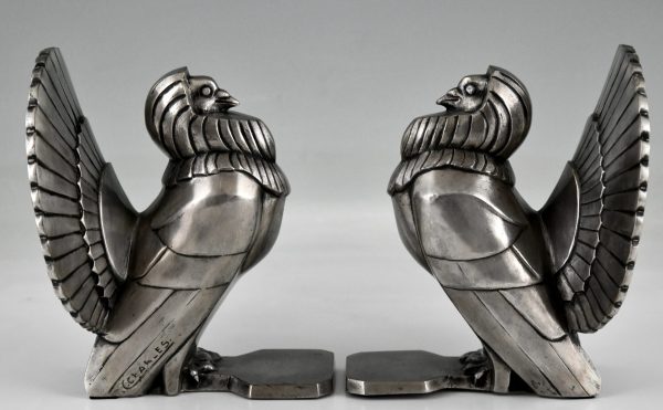 Art Deco boekensteunen met duiven verzilverd brons