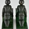 Art Deco child bookends, little girls pushing a cube.