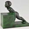 Art Deco child bookends, little girls pushing a cube.