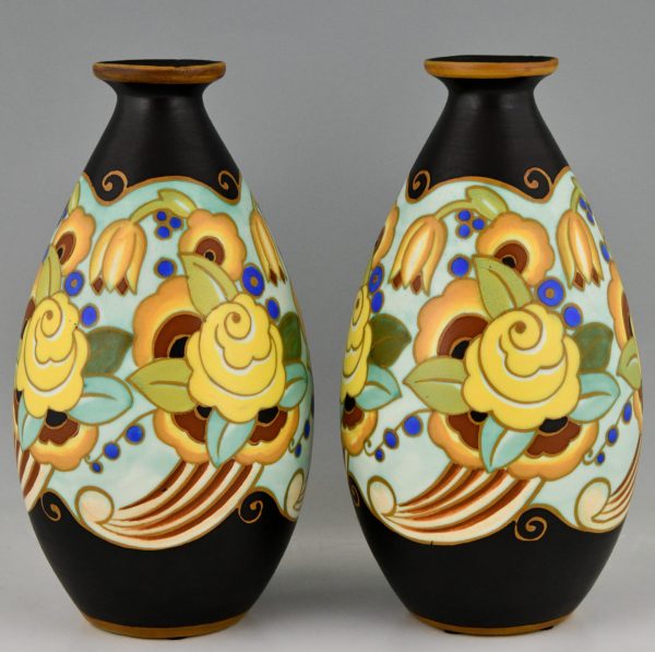 Art Deco ceramic vases with flowers.