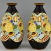 Art Deco ceramic vases with flowers.