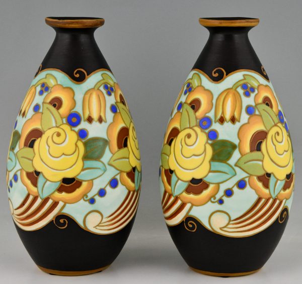 Art Deco ceramic vases with flowers.