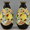 Art Deco ceramic vases with flowers.