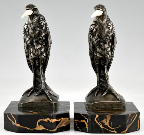 Art Deco bronzen boekensteunen met reigers