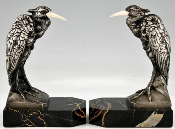 Art Deco bronzen boekensteunen met reigers