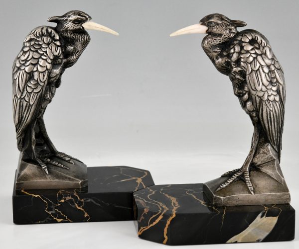 Art Deco bronzen boekensteunen met reigers