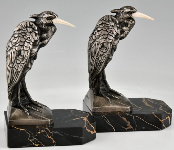 Art Deco bronzen boekensteunen met reigers