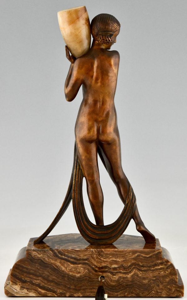 Art Deco bronze lamp sculpture draped nude holding a vase