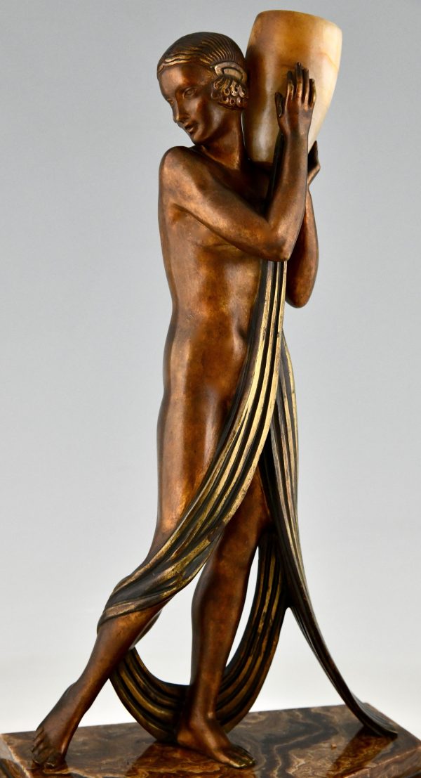 Art Deco bronze lamp sculpture draped nude holding a vase