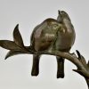 Art Deco sculptuur twee vogels op een tak.