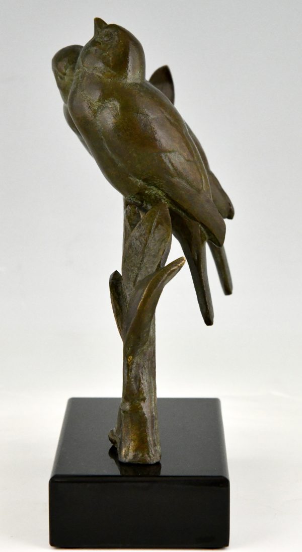 Art Deco sculptuur twee vogels op een tak.