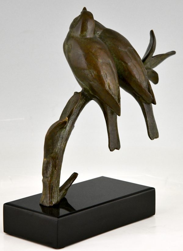 Art-Deco-Skulptur zwei Vögel auf einem Ast.