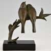 Art Deco sculptuur twee vogels op een tak.