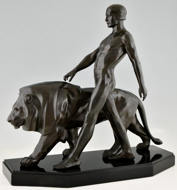 Art Deco sculpture of a male nude walking with lion Belluaire