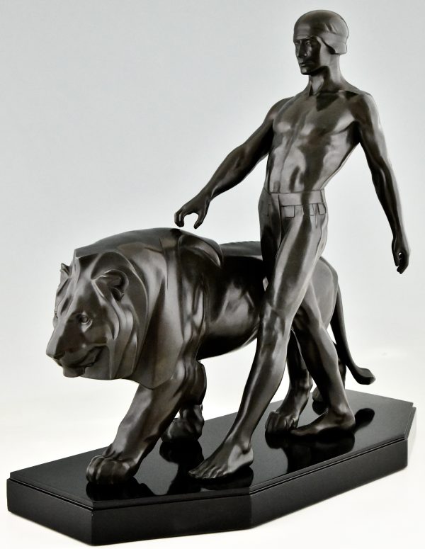 Art Deco sculpture of a male nude walking with lion Belluaire