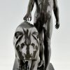 Art Deco sculpture of a male nude walking with lion Belluaire