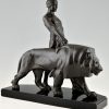 Art Deco sculpture of a male nude walking with lion Belluaire