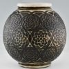 Art Deco spherical ceramic vase with stylized motifs.