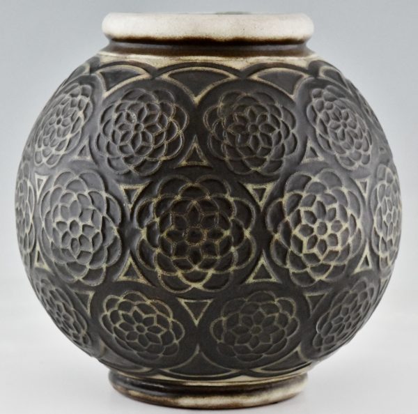 Art Deco spherical ceramic vase with stylized motifs.