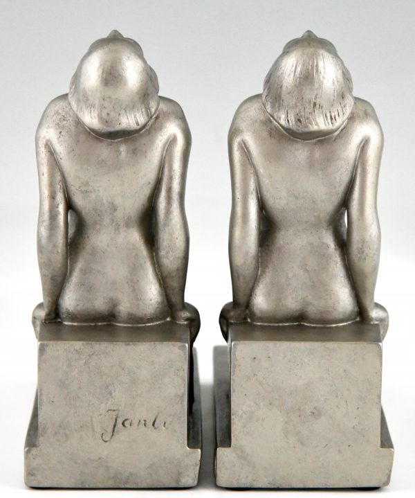 Art Deco bookends with seated nudes.