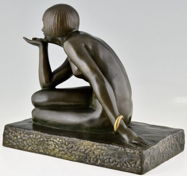 Enigme Sculpture Art Deco en bronze nu assis