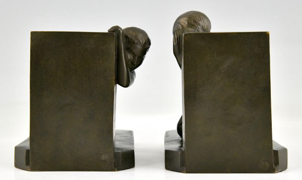 Serre-livres Art Déco en bronze femme nue au satyre