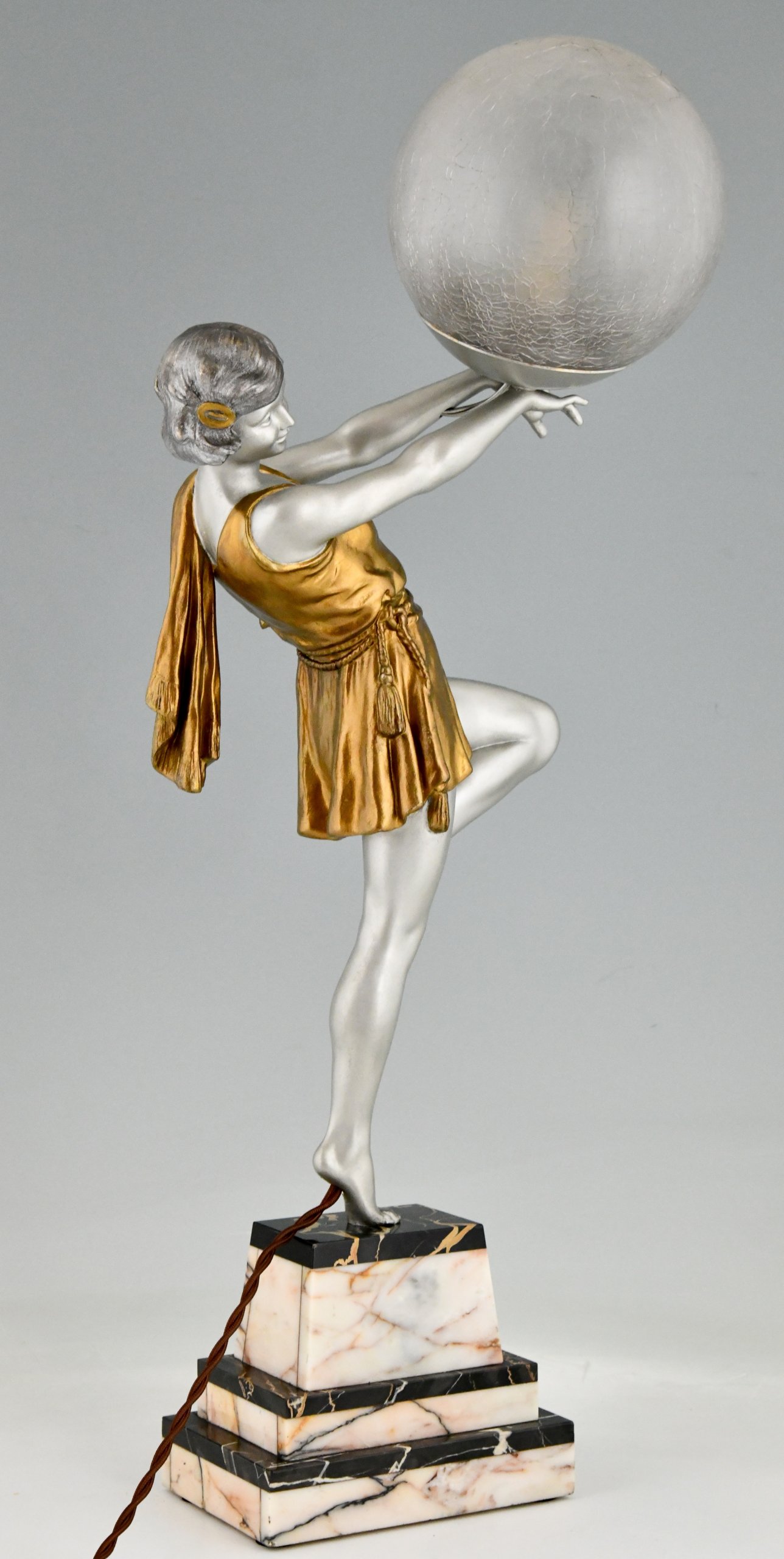 Art Deco lamp lady holding a ball.