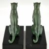 Art Deco bookends seated panthers.