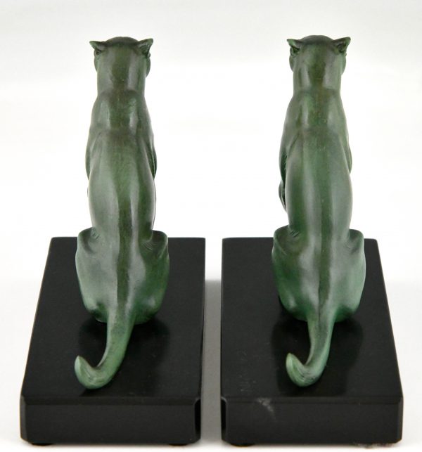 Art Deco bookends seated panthers.