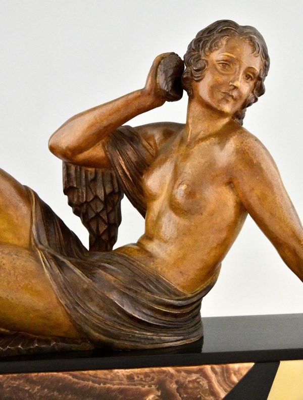Art Deco sculpture seated nude with shell, The Echo.