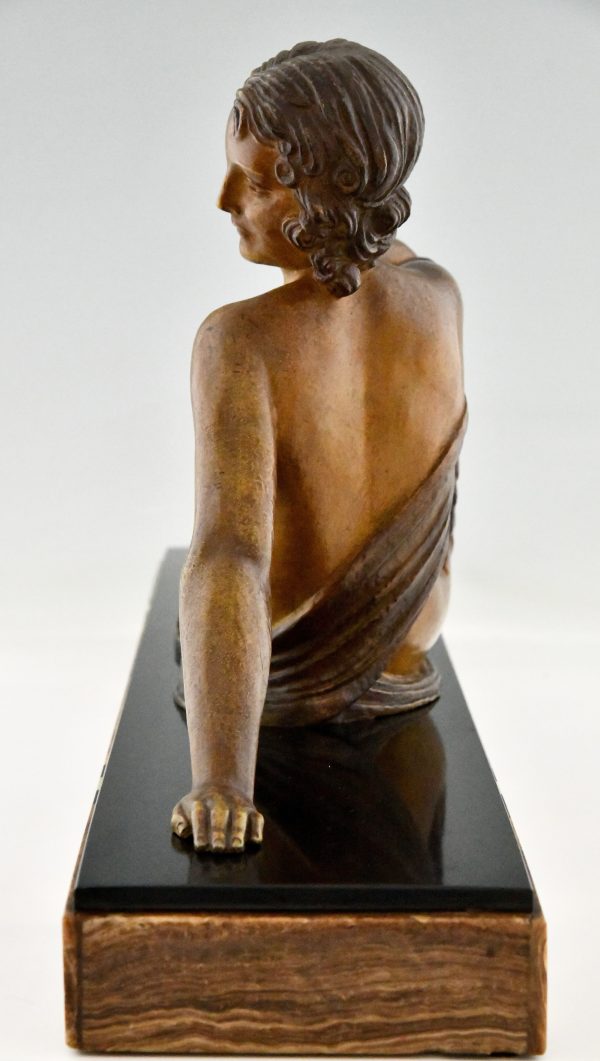 Art Deco sculpture seated nude with shell, The Echo.