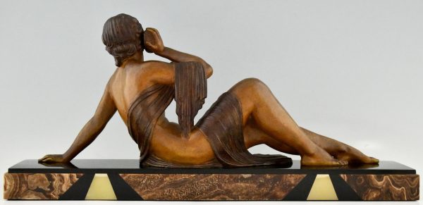 Art Deco sculpture seated nude with shell, The Echo.