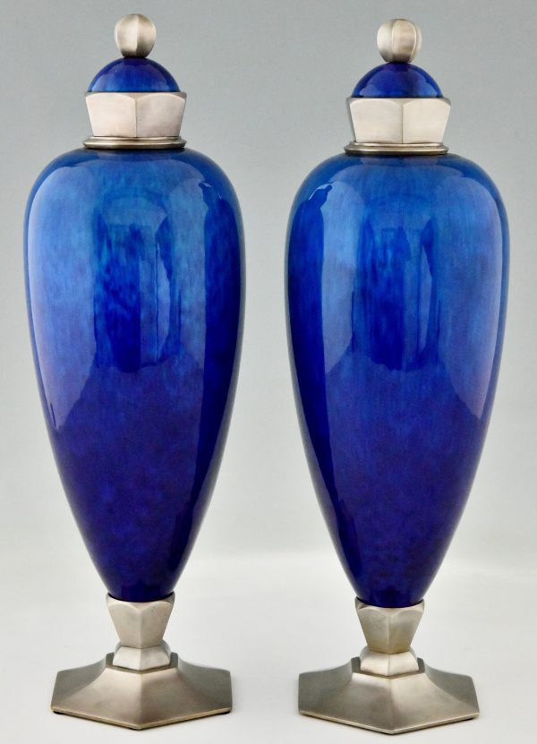 Art Deco blue ceramic and bronze vases or urns.