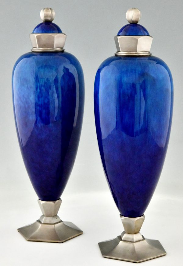 Art Deco blue ceramic and bronze vases or urns.