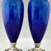 Art Deco blue ceramic and bronze vases or urns.