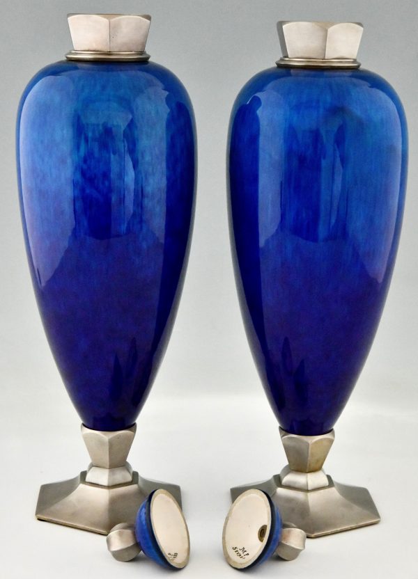 Art Deco blue ceramic and bronze vases or urns.