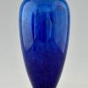 Art Deco blue ceramic and bronze vases or urns.