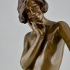 Art Nouveau bronze sculpture teenage boy with apple.