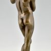 Art Nouveau bronze sculpture teenage boy with apple.