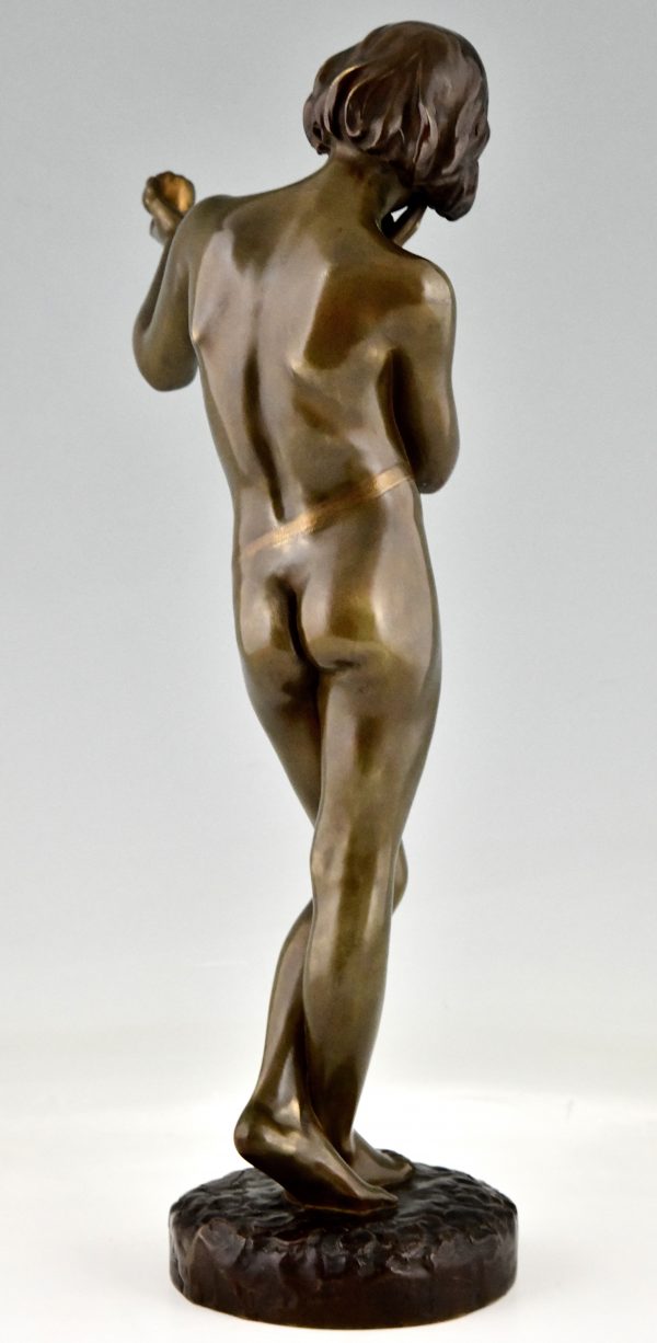 Art Nouveau bronze sculpture teenage boy with apple.