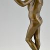 Art Nouveau bronze sculpture teenage boy with apple.