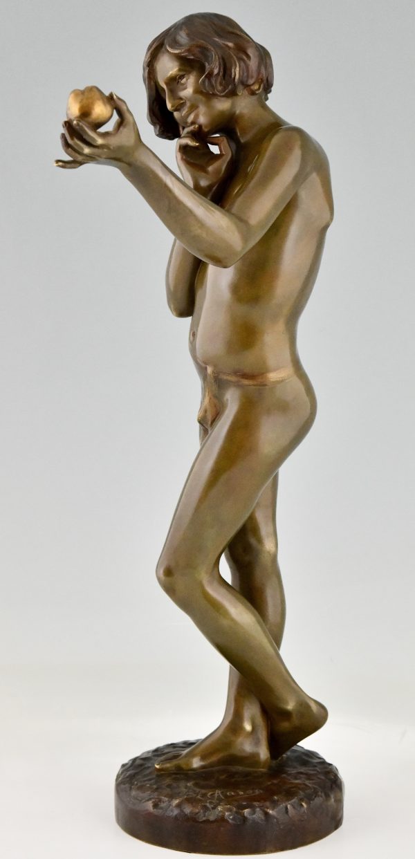 Art Nouveau bronze sculpture teenage boy with apple.